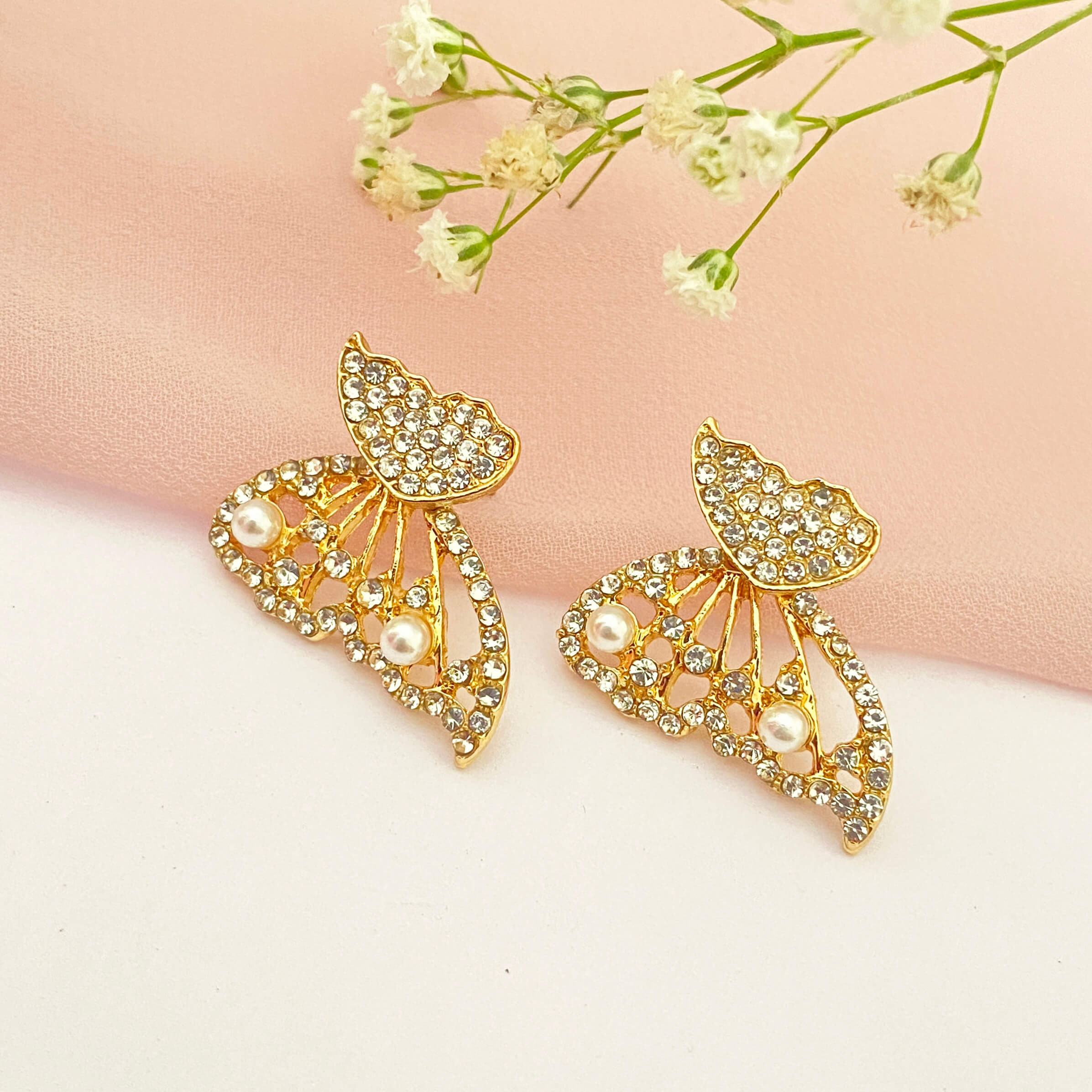 Buy ToniQ Pearls Gold-Plated Butterfly Stud Earrings for Women Online At  Best Price @ Tata CLiQ